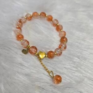 Beaded bracelet with heart charm