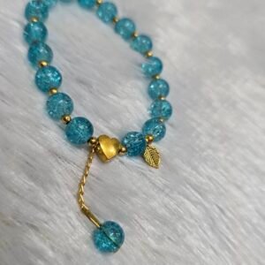Beaded bracelet with heart charm