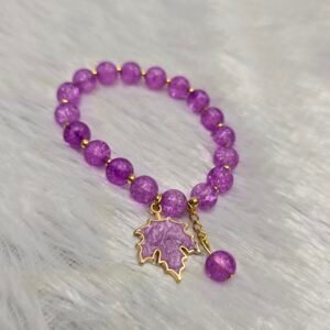 Beaded bracelet with leaf charm