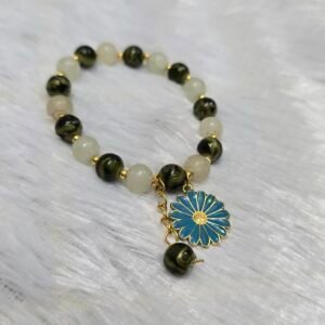 Beaded bracelet with flower charm