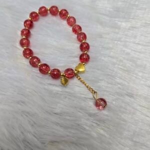 Beaded bracelet with heart charm