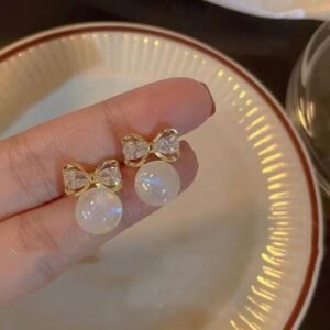 Bow design with crystal and pearl earrings