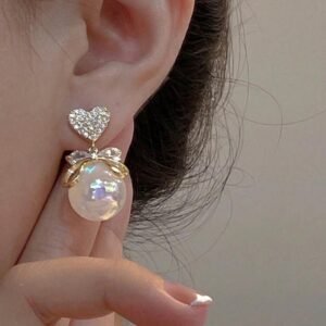 Gold toned pearl stud earrings