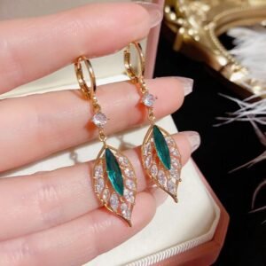 Leaf shaped earrings with green stones