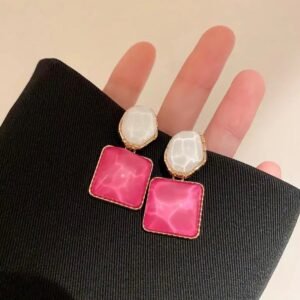 White hexagon and pink square drop earrings