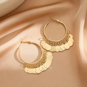Hoop earrings with dangling disc charms