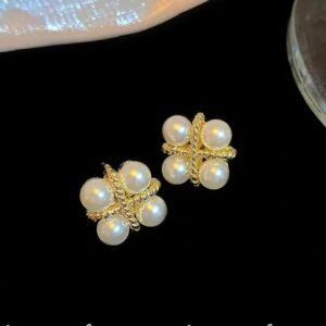 Gold twist cross pearl stud