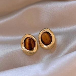 Brown oval shaped stud