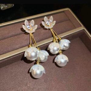 Faux pearls and floral and dangle earrings