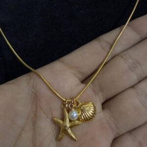 Gold plated necklace seashell and starfish