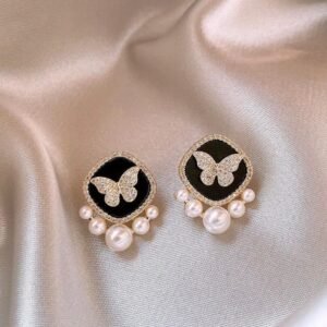 Midnight butterfly pearls stud